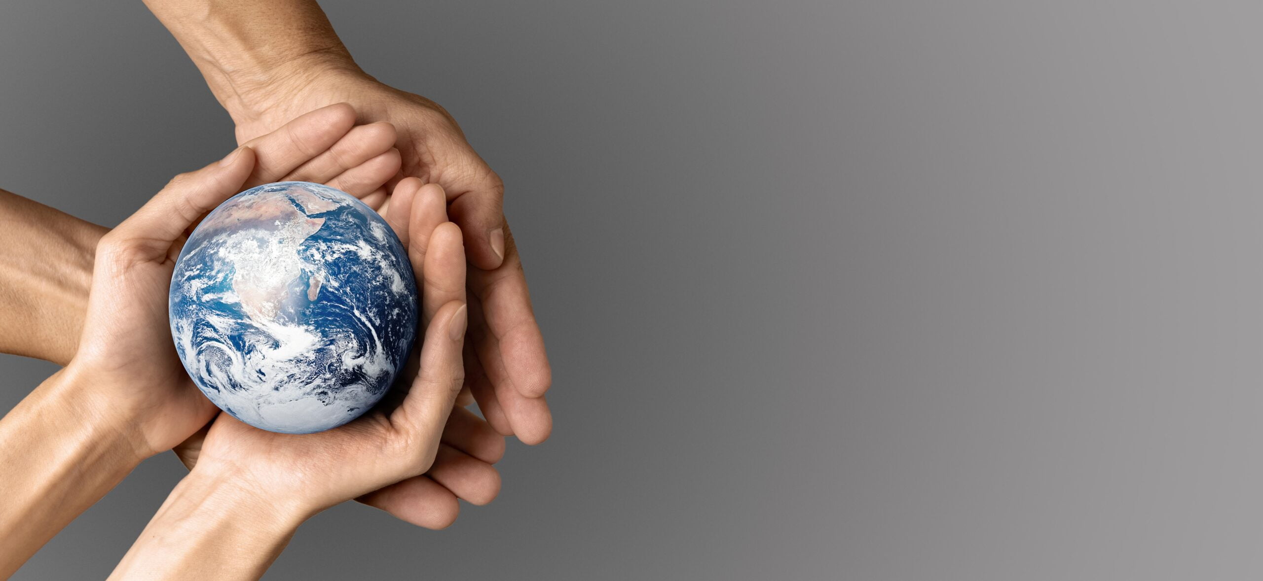 people-holding-the-earth-in-their-hands
